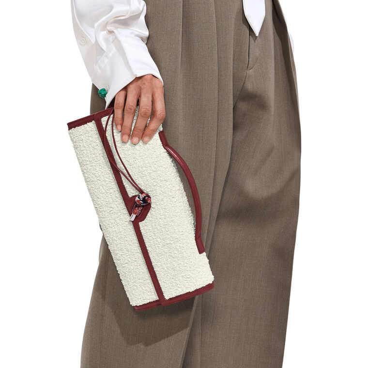 Andiamo Clutch In Curly Raffia image number null